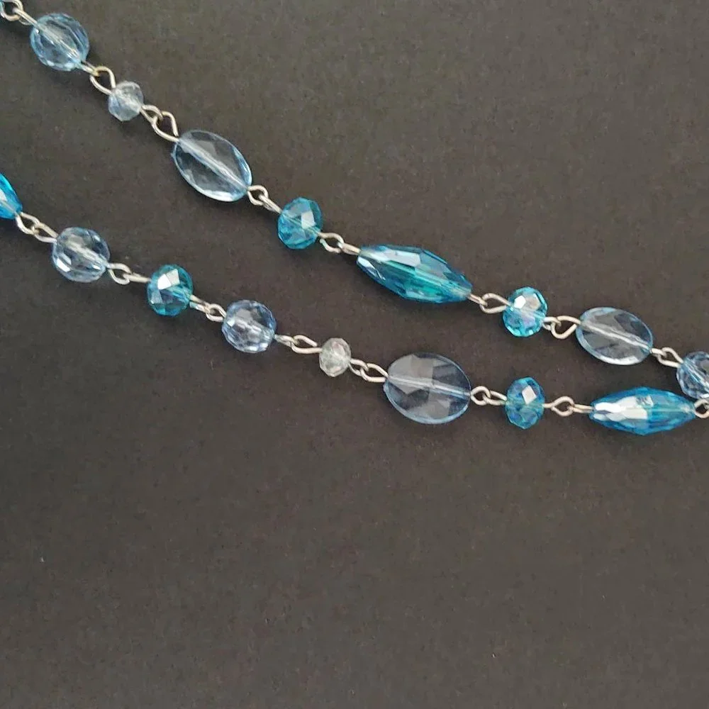 Long double strand blue beaded necklace